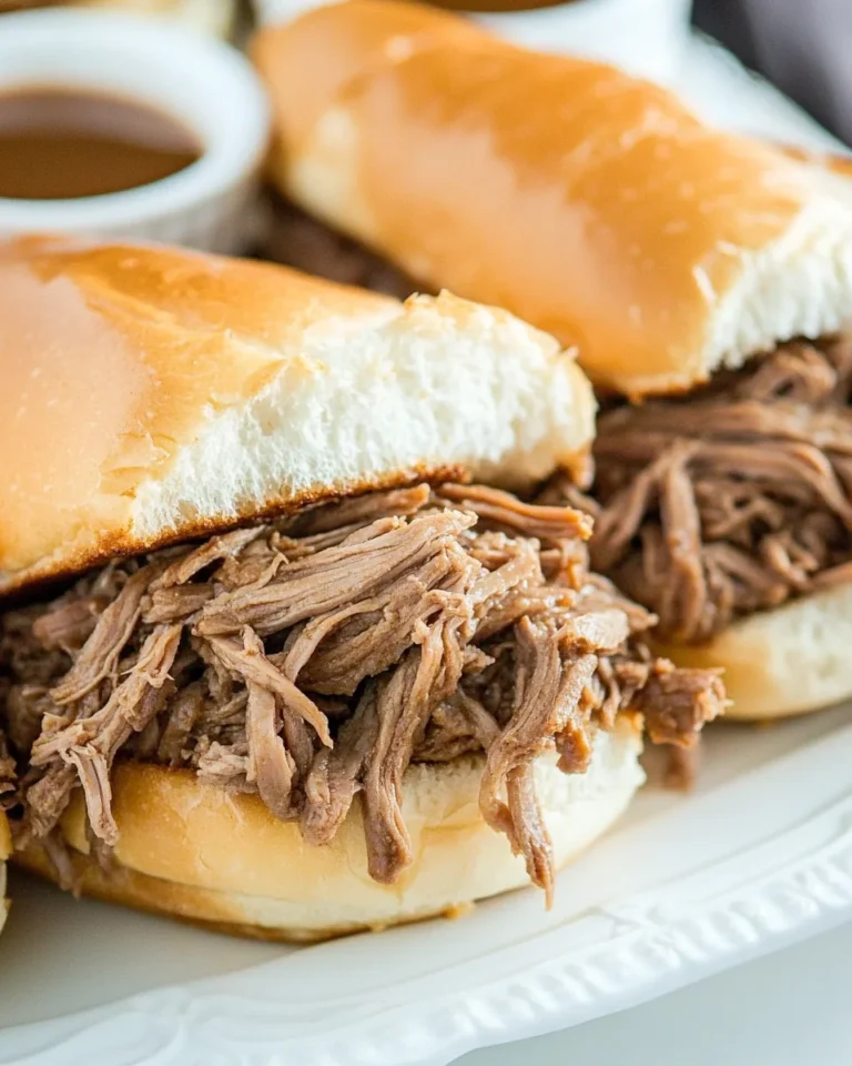 Perfect Slow Cooker Shredded Beef Sandwiches